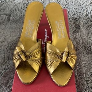 Salvatore Ferragamo, super soft, gold leather toggled slides